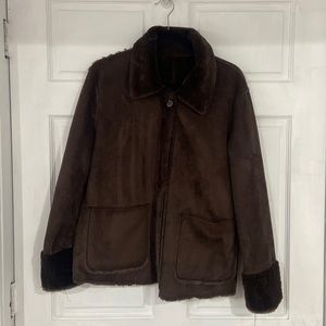 Brand new brown jacket with fur inside.